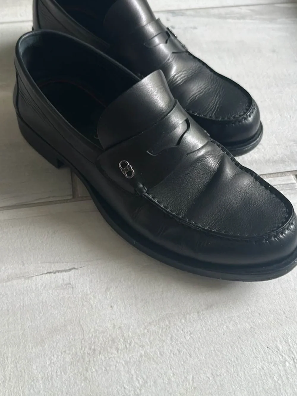 Salvatore Ferragamo Black Leather Penny Loafers
